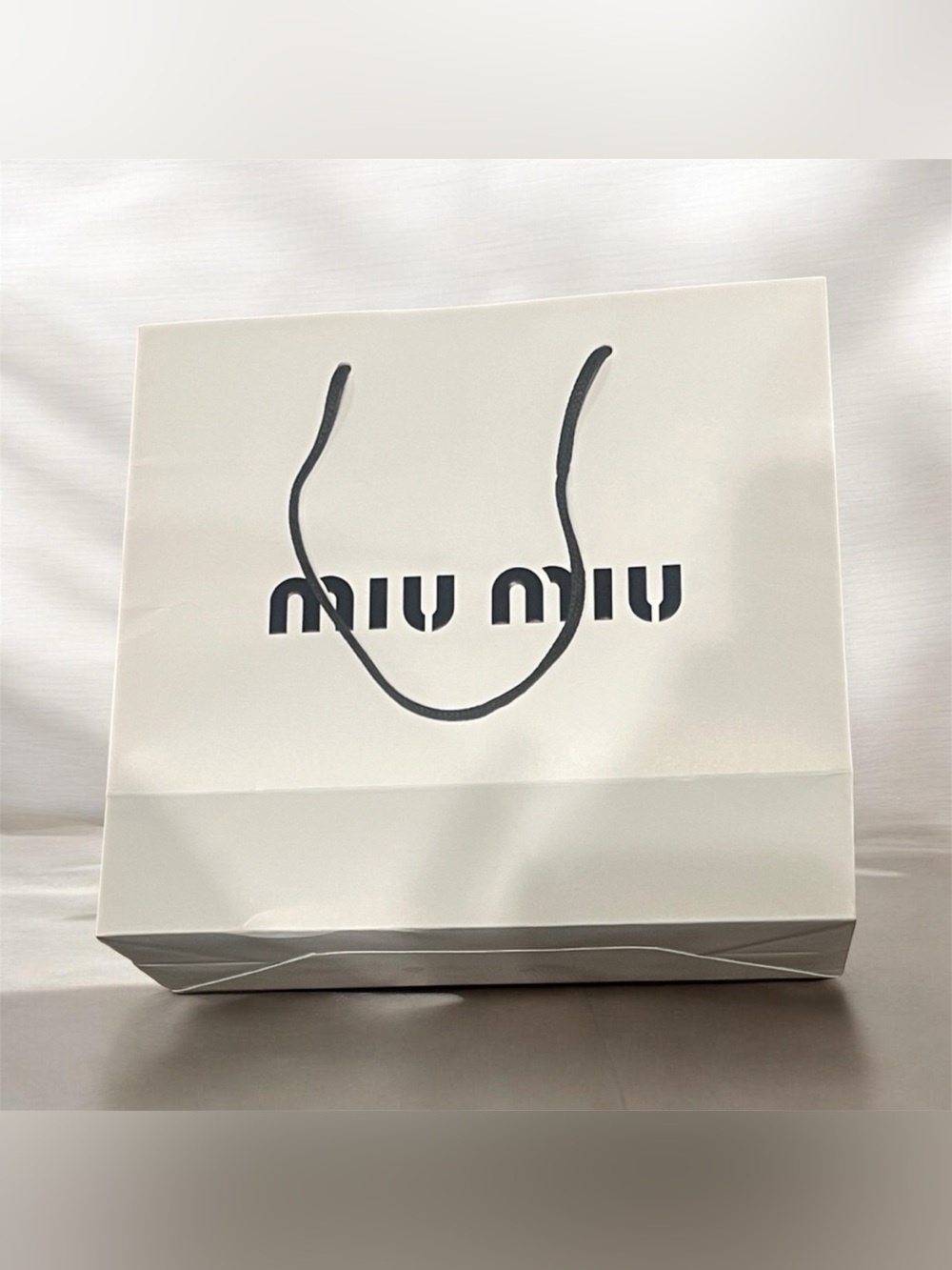 Miu Miu Blue Bag with Black Handles